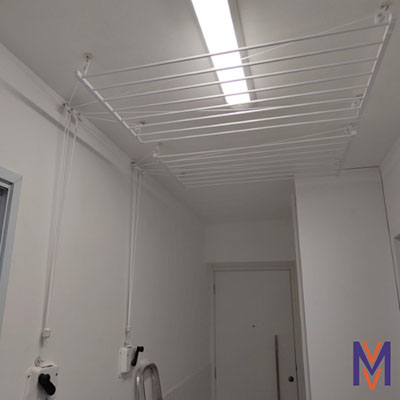 Instalação de varal de teto: organização e funcionalidade na lavanderia residencial da MV Varais